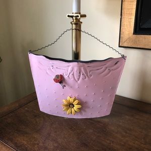 Adorable pink metal wall pocket!